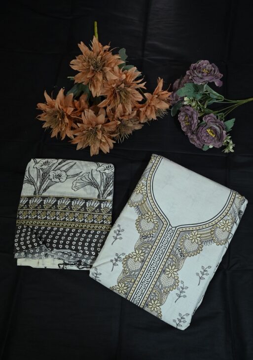 Cream with black print suit and plane bottom