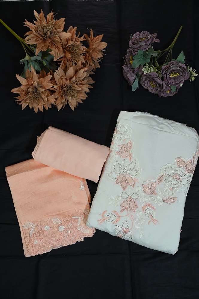 Cotton white suit with peach embroidery and plane bottom and embroided dupatta
