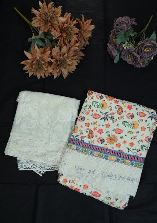 White georgette print with lace work and self embroided dupatta