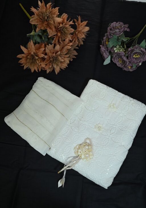 Full white shirt with white embroidery and white self dupatta