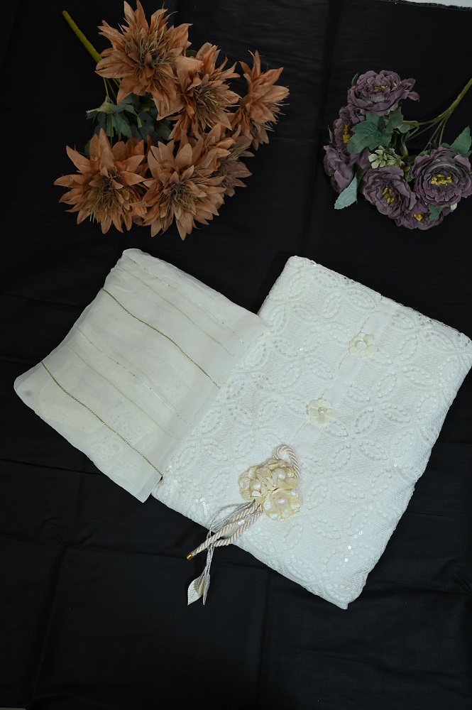 Full white shirt with white embroidery and white self dupatta